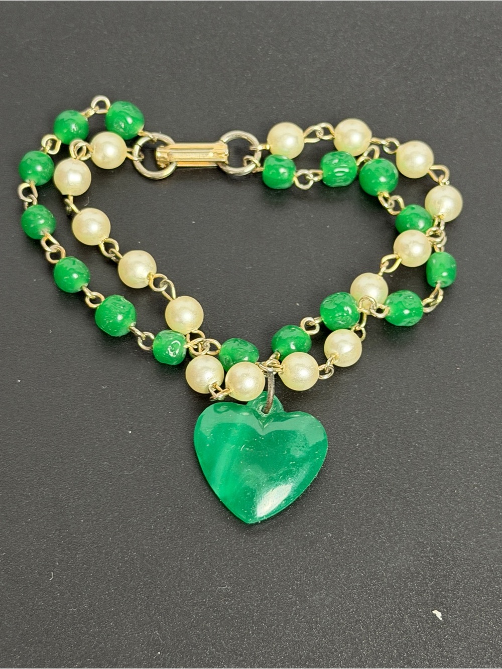 Gold-Tone Bracelet with Green Heart Pendant and Pearl Style Beads